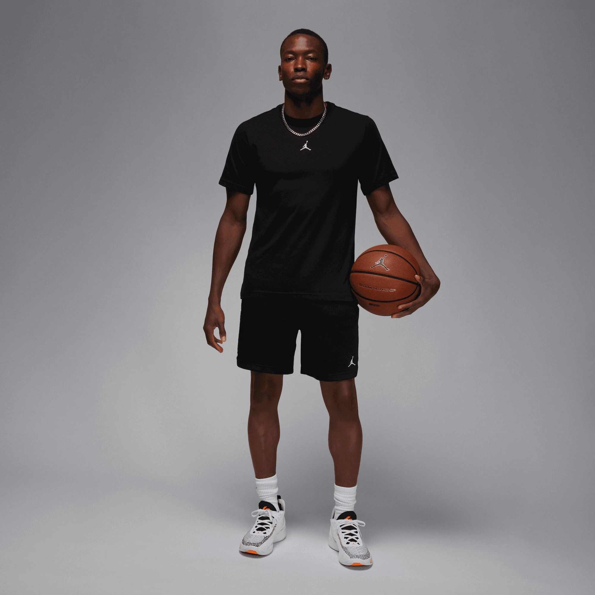 JORDAN | DRI FIT SHORT-SLEEVE TOP { BLACK
